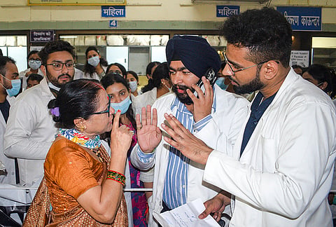 PG doctors of Sushila Tiwari Hospital stage a protest demanding an increase in their stipend, in Haldwani, Uttarakhand. 