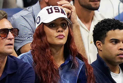 Soccer player Trinity Rodman, center, watches her boyfriend Ben Shelton, of the United States, compete against Frances Tiafoe, of the United States, during the men's singles semifinals of the U.S. Open tennis championships Friday, Sept. 11, 2026, in New York. 
