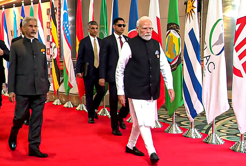 Prime Minister Narendra Modi along with External Affairs Minister S Jaishankar arrive to attend the 18th BRICS Summit, at Bharat Mandapam, in New Delhi. 