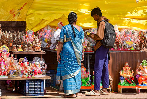 Idols of Lord Ganesh displayed for sale at a roadside shop ahead of the 'Ganesh Chaturthi' festival, in Chikkamagaluru, Karnataka.