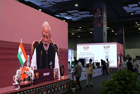 A big screen at the media centre shows Prime Minister Narendra Modi during the 18th BRICS Summit, at the Bharat Mandapam, in New Delhi, Saturday, Sept. 12, 2026. 
