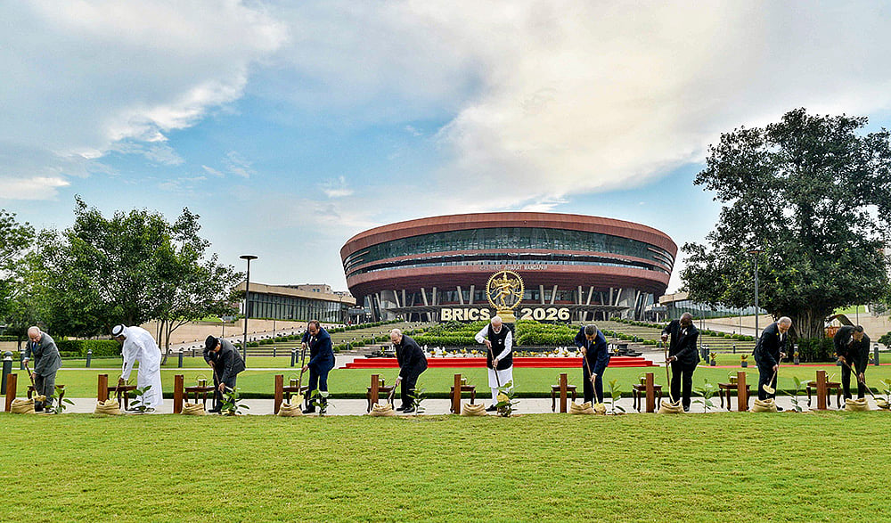 From left, Brazils Foreign Minister Mauro Vieira, Abu Dhabi Crown Prince Sheikh Khaled bin Mohamed bin Zayed Al Nahyan, Indonesian President Prabowo Subianto, Egyptian President Abdel Fattah el-Sisi, Russian President Vladimir Putin, Prime Minister Narendra Modi, Chinese President Xi Jinping, South African President Cyril Ramaphosa, Iranian President Masoud Pezeshkian and Ethiopian Prime Minister Abiy Ahmed Ali during a joint tree plantation initiative amid the ongoing 18th BRICS Summit, at the Bharat Mandapam, in New Delhi. 