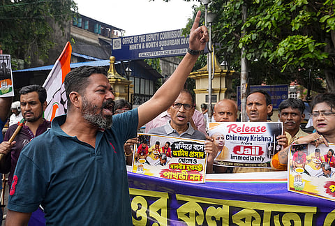 Congress activists stage a protest outside the Deputy Commissioner of Police (North) office following the arrest of party South Kolkata district general secretary Atanu Das for allegedly burning a photograph of Bageshwar Dham chief priest Dhirendra Krishna Shastri during a protest against the self-styled godman's remarks on meat during Durga Puja and over the plight of incarcerated Bangladeshi Hindu monk Chinmoy Krishna Das Prabhu, in Kolkata, West Bengal.