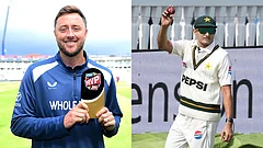 Olli Robinson (left) with mvp trophy and Pakistan's Mohammad Abbas holds up the ball as he celebrates his five-wicket haul on day four of the second cricket test match between England and Pakistan in London, Sunday, Aug. 30, 2026 - ECB and (AP Photo/Dave Shopland)