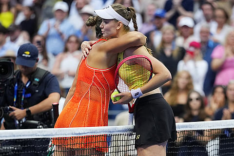 Elena Rybakina, of Kazakhstan, right, embraces Aryna Sabalenka, of Belarus, after Rybakina won the women's singles final of the U.S. Open tennis championships in New York.