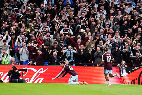 Aston Villa's Edward Alysson celebrates scoring his side's first goal during the English Premier League soccer match between Aston Villa and Nottingham Forest in Birmingham, England.