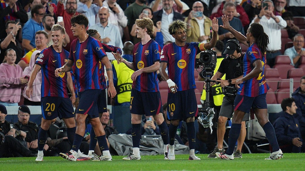 Barcelona's Lamine Yamal, second right, celebrates with teammates after scoring his side's fourth goal during the Champions League opening phase soccer between Barcelona and Feyenoord in Barcelona. - Emilio Morenatti/AP Photo