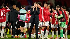 Manchester United's head coach Michael Carrick claps hands after winning the Champions League opening phase soccer match between Manchester United and Sabah FK in Manchester. - Dave Thompson/AP Photo