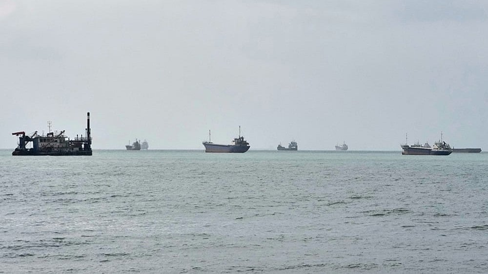 Commercial vessels are anchored in the Strait of Hormuz off Bandar Abbas, Iran. - | Photo: AP/Vahid Salemi