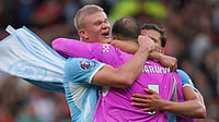 Premier League Referees Admit VAR ‘Error of Judgment’ On Erling Haaland Derby Winner Against Manchester United Ian Hodgson/AP Photo : Manchester City's Erling Haaland, left, Manchester City's goalkeeper Gianluigi Donnarumma, Manchester City's Ruben Dias celebrate after the English Premier League soccer match between Manchester United and Manchester City in Manchester.