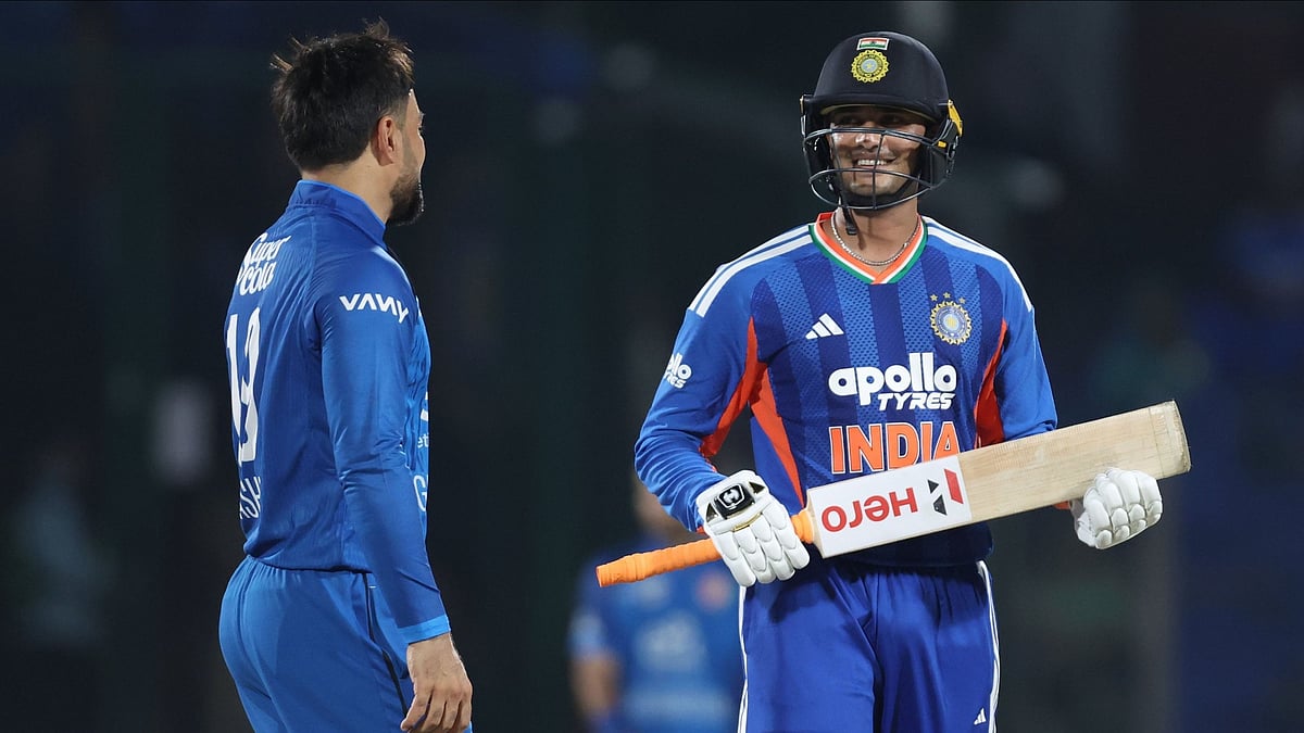 Rashik Khan (left) and Abhishek Sharma (right) intereacting during the India vs Afghanistan 1st T20I - X/BCCI