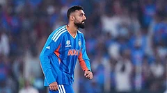 India's Varun Chakravarthy celebrates the wicket of Netherlands' Aryan Dutt during the T20 World Cup cricket match between India and Netherlands in Ahmedabad. - | Photo: AP/Ajit Solanki
