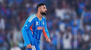 | Photo: AP/Ajit Solanki : India's Varun Chakravarthy celebrates the wicket of Netherlands' Aryan Dutt during the T20 World Cup cricket match between India and Netherlands in Ahmedabad.