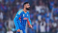 | Photo: AP/Ajit Solanki : India's Varun Chakravarthy celebrates the wicket of Netherlands' Aryan Dutt during the T20 World Cup cricket match between India and Netherlands in Ahmedabad.