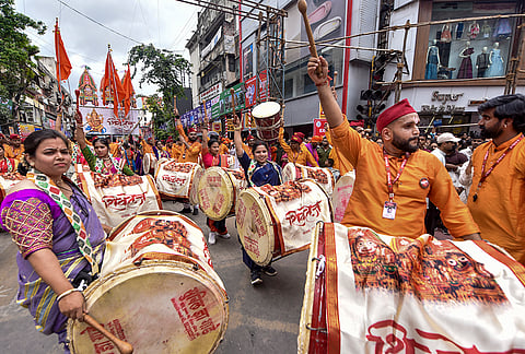 Devotees celebrate with traditional drums and music during the ‘Ganesh Chaturthi’ festival, in Pune, Maharashtra, Monday, Sept. 14, 2026. 