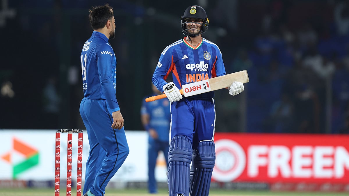 Rashik Khan (left) and Abhishek Sharma (right) intereacting during the India vs Afghanistan 1st T20I - X/BCCI