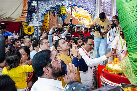 In this image posted on Sept. 14, 2026, Maharashtra Chief Minister Devendra Fadnavis and Deputy CM Eknath Shinde offer prayers at Lalbaugcha Raja on Ganesh Chaturthi, in Mumbai, Maharashtra.