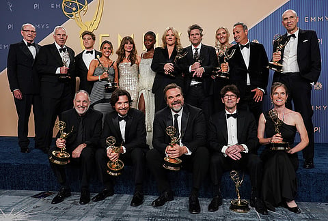 The team from "DTF St. Louis" pose in the press room with the award for outstanding limited or anthology series during the 78th Emmy Awards on Monday, Sept. 14, 2026, at the JW Marriott in Los Angeles. 