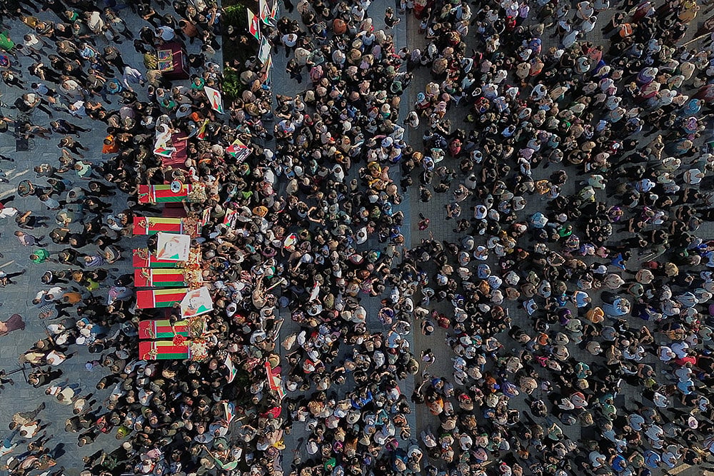 Funeral for victims of a deadly prison fire and riot in northern Syria