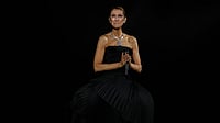  (AP Photo/Aurelien Morissard) : Singer Celine Dion performs during the opening concert of her "Celine Dion Paris 2026" residency at the Plenitude Arena in Nanterre, France, outside Paris, Saturday, Sept. 12, 2026