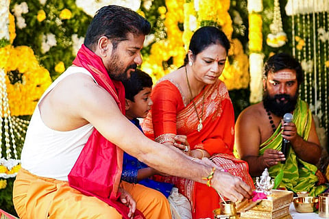 In this image posted on Sept. 14, 2026, Telangana Chief Minister A Revanth Reddy performs 'Ganapati puja' with family members on the occasion of Vinayaka Chavithi, in Telangana.
