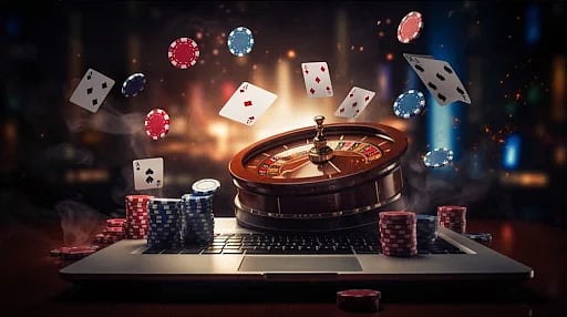 Roulette wheel, cards, and poker chips