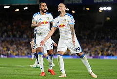 Leeds United's Noah Okafor, right, celebrates scoring their side's fourth goal with Dominic Calvert-Lewin during the English Premier League soccer match between Leeds United and Newcastle United in Leeds, England, Monday, Sept. 14, 2026. - | Photo: Annabel Lee-Ellis/PA via AP