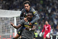 Inter Survive Udinese Scare To Complete Stunning 5-3 Comeback At San Siro | Photo: AP/Antonio Calanni : Inter Milan's Ange-Yoan Bonny, down, celebrates with Inter Milan's Kristjan Asllani after scoring his sides fifth goal during the Serie A soccer match between Inter Milan and Udinese in Milan, Italy, Monday, Sept. 14, 2026.