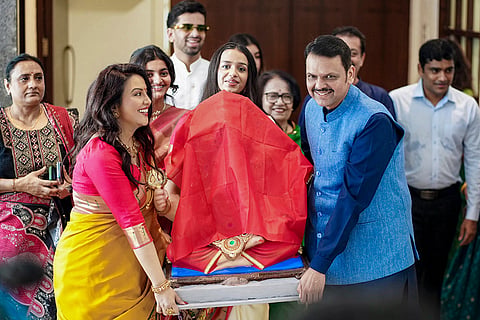 In this image posted on Sept. 14, 2026, Maharashtra Chief Minister Devendra Fadnavis performs Ganesh Sthapna puja with family members on the occasion of Vinayaka Chavithi, in Mumbai, Maharashtra.