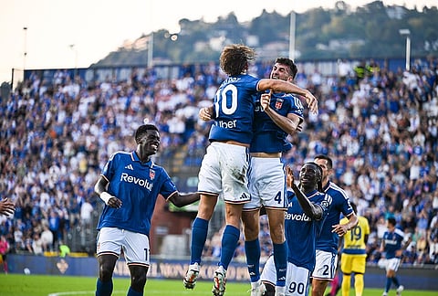 Como's Nico Paz celebrates scoring during the Serie A soccer match between Como and Parma,  in Como, Italy, Monday, Sept. 14, 2026. 
