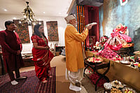 Ganesh Chaturthi 2026: A Look At How Leaders Marked The Festival | Photo: PMO via PTI : In this image received on Sept. 14, 2026, Prime Minister Narendra Modi performs a ritual as Union Minister Piyush Goyal and his wife look on during the PM's visit to Union Minister’s residence on ‘Ganesh Chaturthi’ festival, in New Delhi.