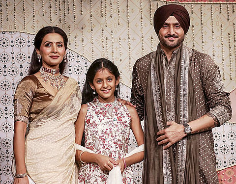 Former cricketer and BJP MP Harbhajan Singh along with his wife Geeta Basra and daughter during ‘Ganesh Chaturthi’ celebrations at the residence of Reliance Industries Chairman Mukesh Ambani, in Mumbai, Maharashtra.