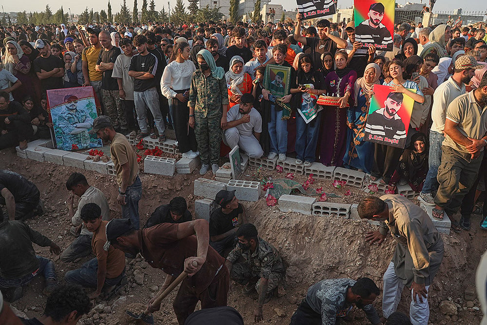 Funeral for victims of a deadly prison fire and riot in northern Syria