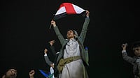 | Photo: AP/Osamah Abdulrahman : Supporters Celebrate As They Attend A Rally Organized By Yemen's Houthi Rebels To Celebrate The Group's Capture Of Mayun Island