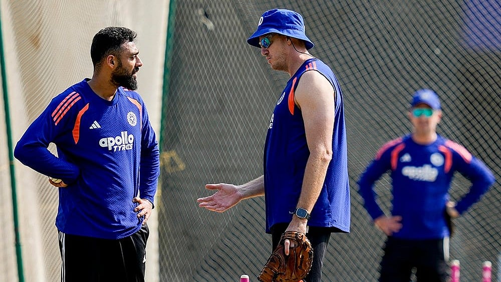 India's Varun Chakaravarthy, left, during a training session ahead of the ICC Men's T20 World Cup 2026 cricket match between India and Zimbabwe, at MA Chidambaram Stadium, in Chennai. - | Photo: PTI/R Senthilkumar
