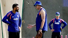 India's Varun Chakaravarthy, left, during a training session ahead of the ICC Men's T20 World Cup 2026 cricket match between India and Zimbabwe, at MA Chidambaram Stadium, in Chennai. - | Photo: PTI/R Senthilkumar