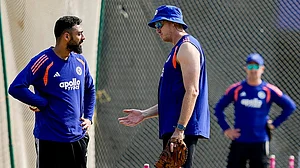 | Photo: PTI/R Senthilkumar : India's Varun Chakaravarthy, left, during a training session ahead of the ICC Men's T20 World Cup 2026 cricket match between India and Zimbabwe, at MA Chidambaram Stadium, in Chennai.