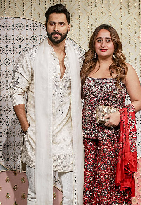 Bollywood actor Varun Dhawan along with fashion designer and his wife Natasha Dalal during ‘Ganesh Chaturthi’ celebrations at the residence of Reliance Industries Chairman Mukesh Ambani, in Mumbai, Maharashtra.