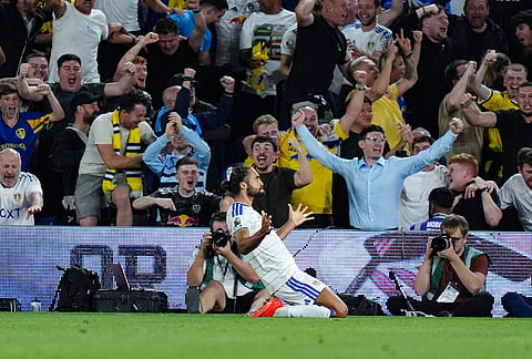 Leeds United's Dominic Calvert-Lewin celebrates scoring during the English Premier League soccer match between Leeds United and Newcastle United in Leeds, England, Monday Sept. 14, 2026. 