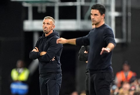 Ipswich Town manager Gary O'Neil, left, and Arsenal manager Mikel Arteta react on the touchline  during the League Cup third round soccer match between Ipswich Town and Arsenal in Ipswich, England, Tuesday, Sept. 15, 2026. 