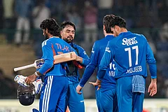 India's Tilak Verma greets Afghanistan's Rashid Khan after India wins the second T20I cricket match between India and Afghanistan, in New Delhi. - | Photo: PTI/Shahbaz Khan