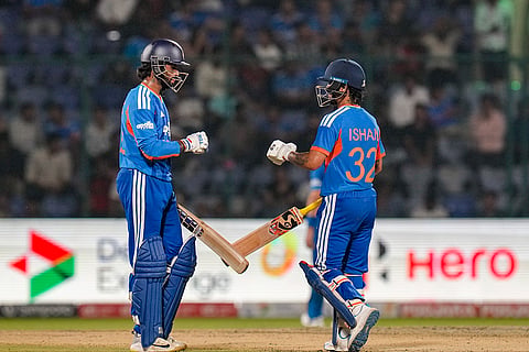 India's Ishan Kishan, right, and Tilak Verma interact between the wickets during the second T20I cricket match between India and Afghanistan, in New Delhi.