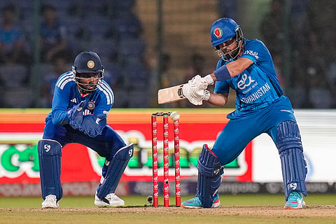 Afghanistan's Darwish Rasooli plays a shot during the second T20I cricket match between India and Afghanistan, in New Delhi.