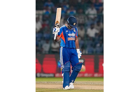 India's Sanju Samson celebrates his half century during the second T20I cricket match between India and Afghanistan, in New Delhi.