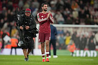 | Photo: AP/Jon Super : Liverpool's Dominik Szoboszlai walks off the pitch after the third-round English Football League soccer match between Liverpool and Tottenham in Liverpool, England.