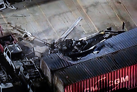 In this still image provided by KABC-TV shows a helicopter that crashed near a deadly bus crash, in Los Angeles.