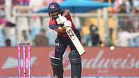 | Photo: AP/Rafiq Maqbool : Nepal's Dipendra Singh Airee plays a shot during the T20 World Cup cricket match between Italy and Nepal in Mumbai, India.