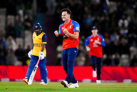England's Sonny Baker celebrates the wicket of Sri Lanka's Kamil Mishara during the first IT20 match between England and Sri Lanka in Southampton, England, Tuesday Sept. 15, 2026. 