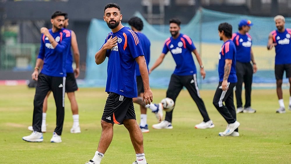 | Photo: PTI/Arun Sharma : India's Varun Chakaravarthy, front, during a practice session ahead of an ICC Men's T20 World Cup 2026 cricket match between India and Pakistan, at R Premadasa Stadium, in Colombo, Sri Lanka.