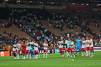 | Photo: AP/Antonio Calanni : Benfica players celebrate at the end of the Europa League opening phase soccer match between AC Milan and Benfica in Milan, Italy.